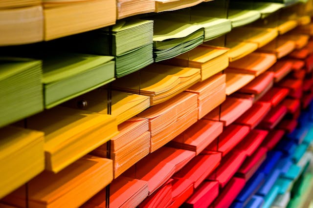 Photo by Pixabay: https://www.pexels.com/photo/multi-colored-folders-piled-up-159519/