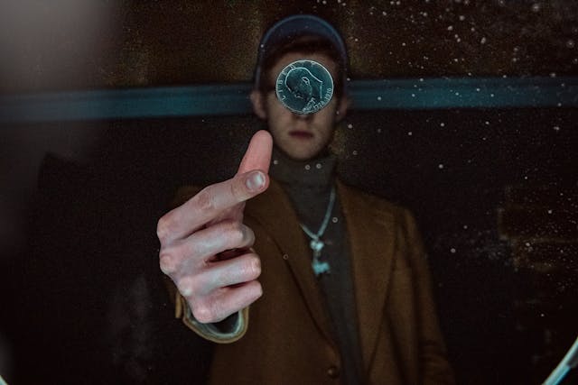 Photo by CocaKolaLips : https://www.pexels.com/photo/a-person-tossing-a-coin-4029695/